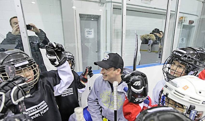 Players Hit 100th Surprise Practice Visit