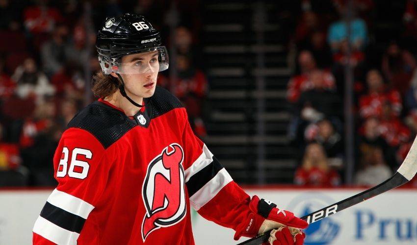 Devils' Jack Hughes gets 1st NHL goal with brother, family watching - ESPN