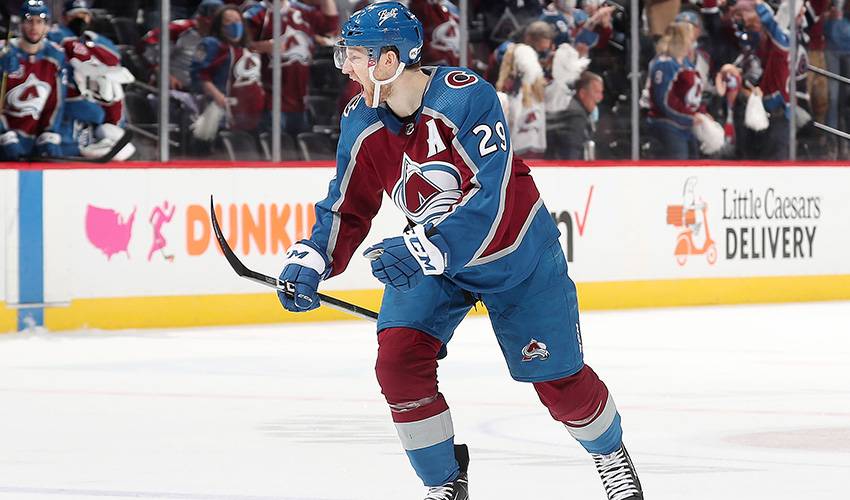 MacKinnon sidelined about a month with upper-body injury
