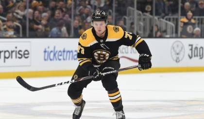 Charlie McAvoy shares spotlight with pup Otto in dog treat launch
