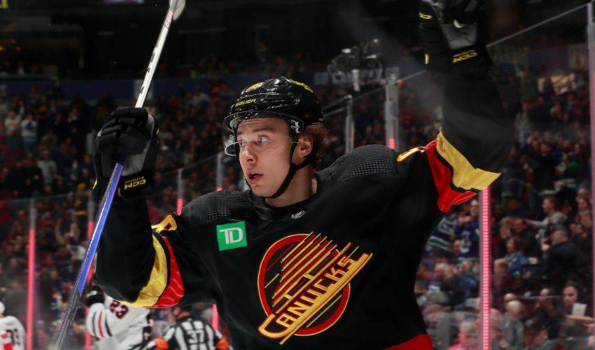 Andrei Kuzmenko of the Vancouver Canucks celebrates his second