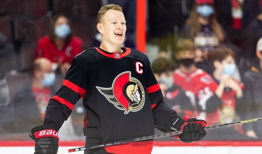 Brady Tkachuk Wearing Matthew Tkachuk's Friendship Tour Shirt